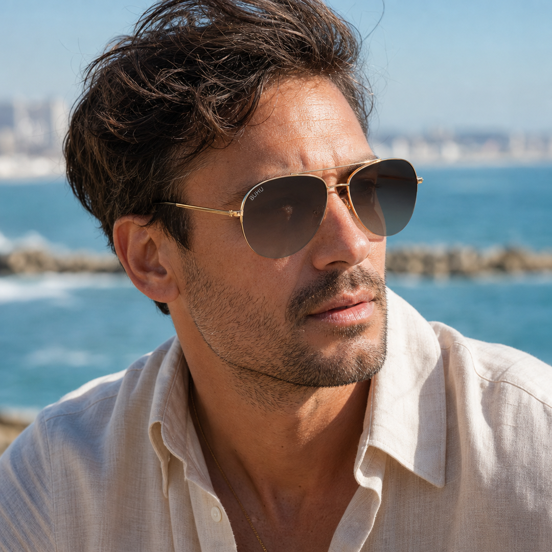 Hombre usando lentes de sol Ginebra Dorado con protección UV400 - Buhu Eyewear